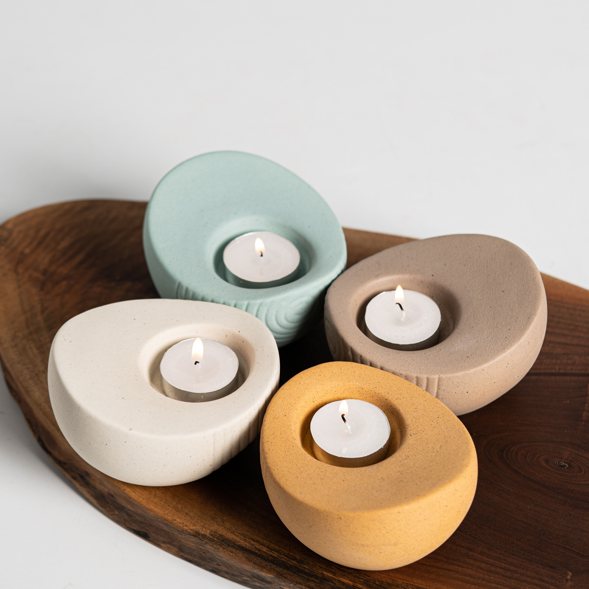 Modern simple four-color Yuanbao ceramic candle candlestick desktop coffee table TV cabinet soft decoration ornament